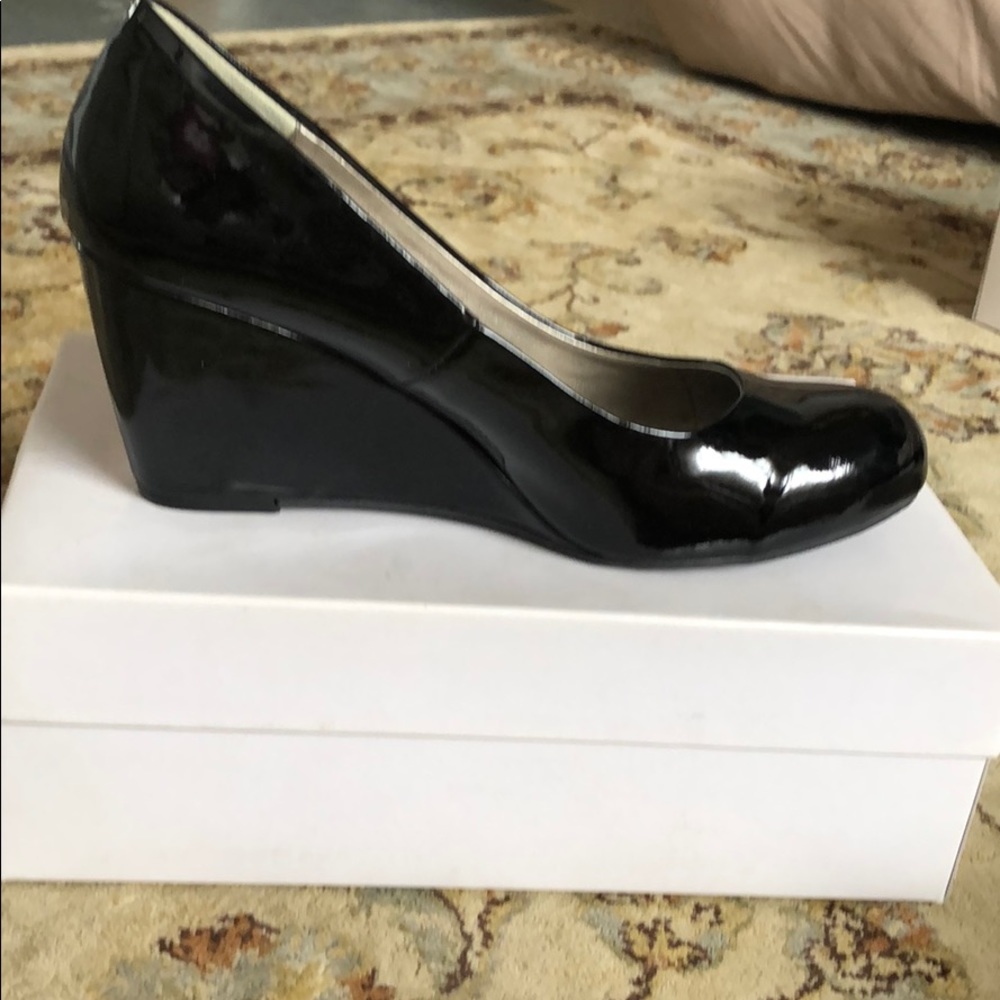 Black patent leather wedge mules